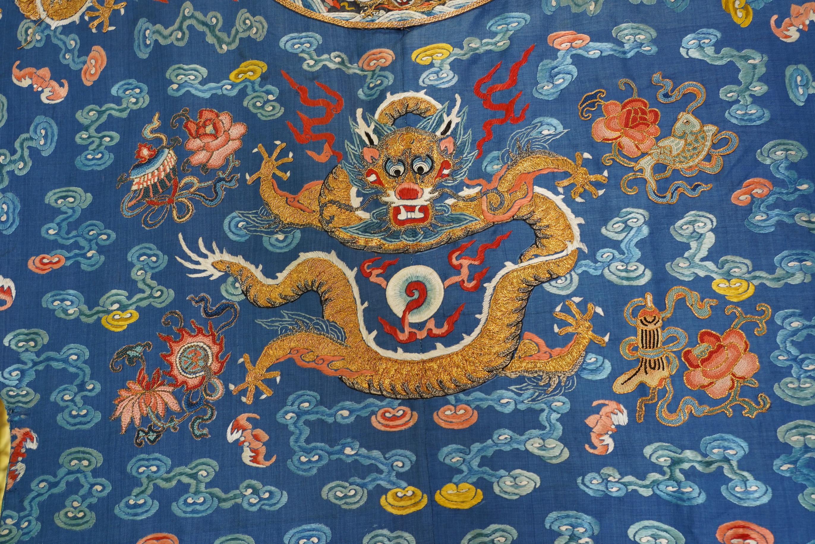 A Chinese blue silk man’s dragon robe, jifu, 19th century